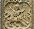 Panel 08:02 - Hybrid with lion's body, woman's head / torso and bat's wings, playing a guitar